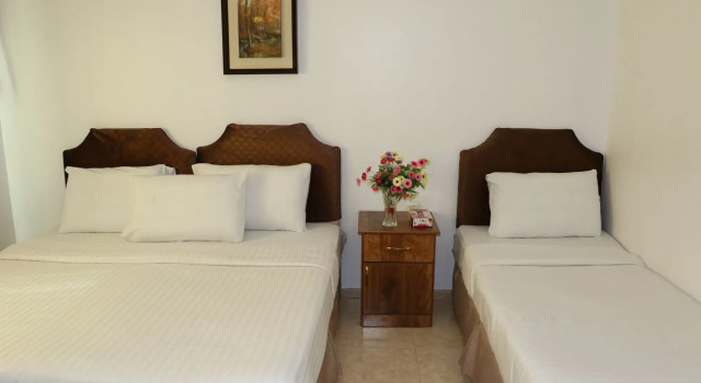 Al Alya Hotel Rooms and Suites