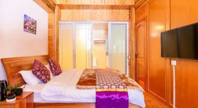 Люкс с 4 комнатами Xiaoyixiongjia Hostel