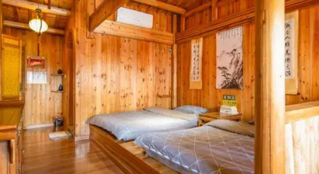 Кровать в общем номере Xiqiao Inn