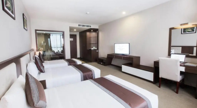 Трёхместный номер Deluxe Muong Thanh Grand Hoang Mai - Nghe An