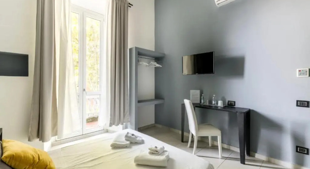 Трёхместный номер Deluxe Merulana 139 Suites