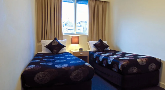 Апартаменты Executive Park Squire Motor Inn & Serviced Apartments