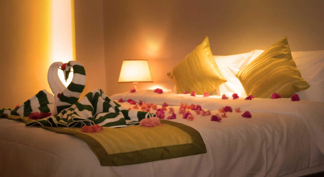 Кровать в общем номере White Beach Suites Boracay