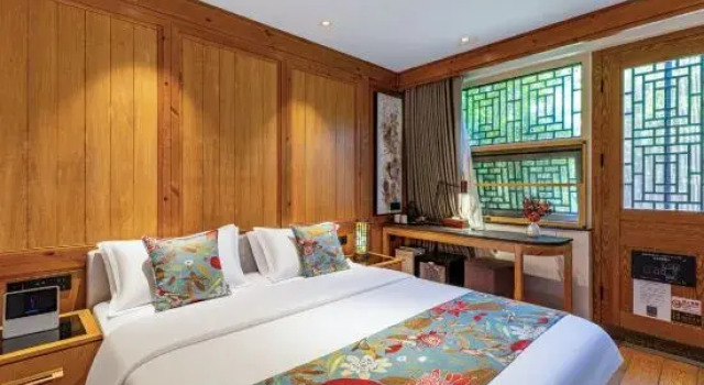 Кровать в общем номере The JOYCourtyard International Hotel near Forbidden City Tiananmen