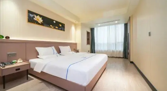 Люкс Deluxe Yiyuehong Hotel (Minnan Shuixiang Branch)