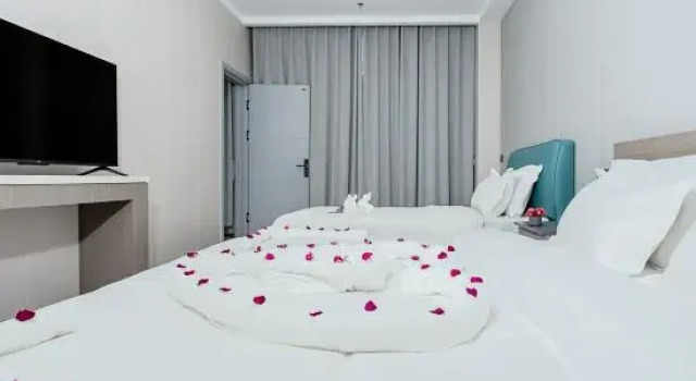 Семейный люкс Longkou Jinli Serviced Apartment Hotel (Longhu Tianjie Poly Plaza)