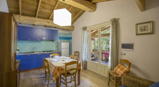 Вилла Deluxe с 2 комнатами Campeggio Villaggio Sos Flores