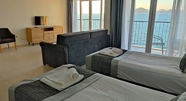 Четырёхместный номер Premium Ni Marin Hotel