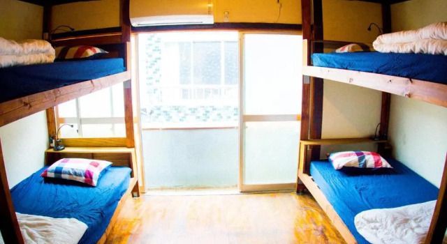 Кровать в общем номере Guesthouse Yadocurly
