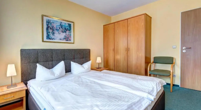 Апартаменты Am Schloonsee Haus C - Apartments mit Strandkorb