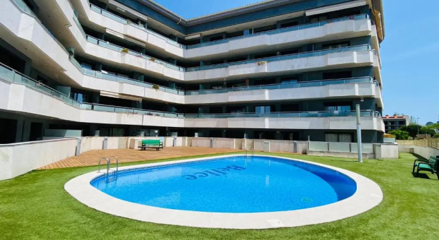 Апартаменты Fenals beach lux apartment with swimming pool