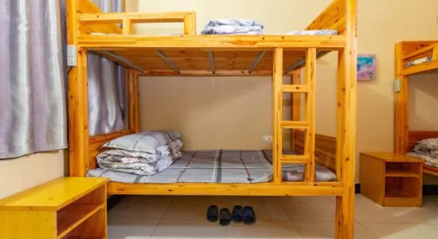 Кровать в общем номере Huashanyi Loft Youth Hostel