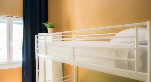 Кровать в общем номере Avenue Hostel & Suites