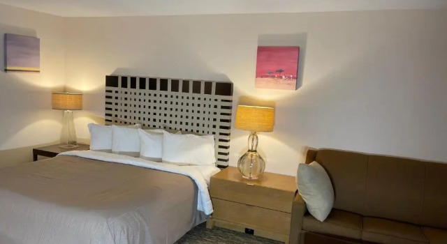 Deluxe Zimmer Rodeway Inn Formerly Camp Inn Lodge