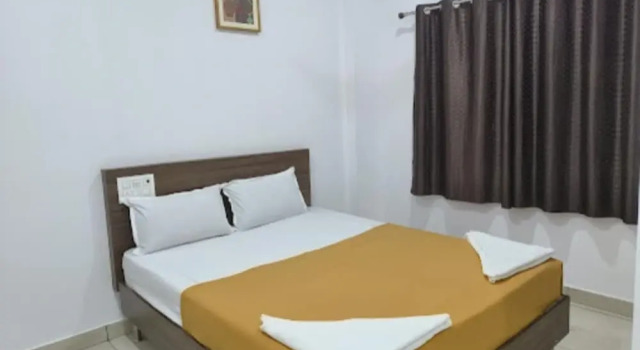 iROOMZ Relax Inn Lodge, Rezervovat Hotel Hotely v Bangalore s parkováním, Parkování