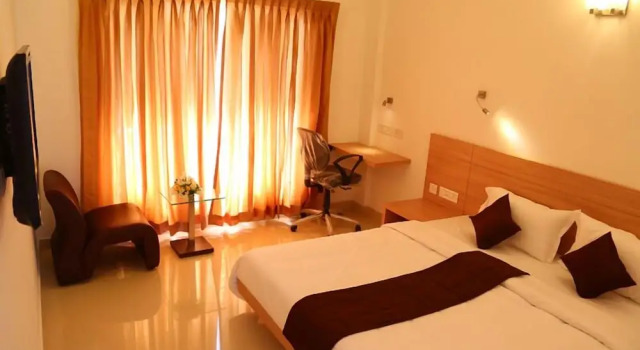 Номер Deluxe Pebbles Serviced Apartments
