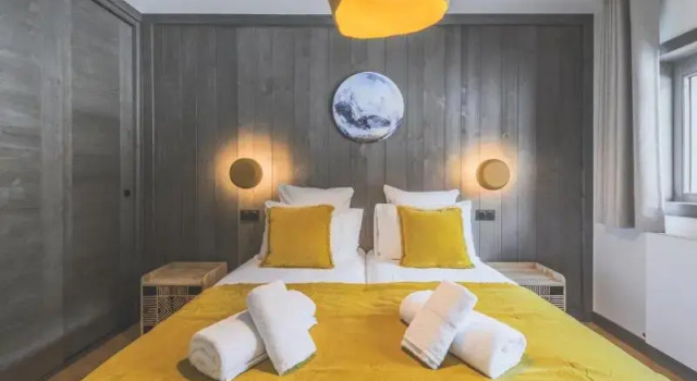 Кровать в общем номере с балконом TERRESENS - Le Quartz