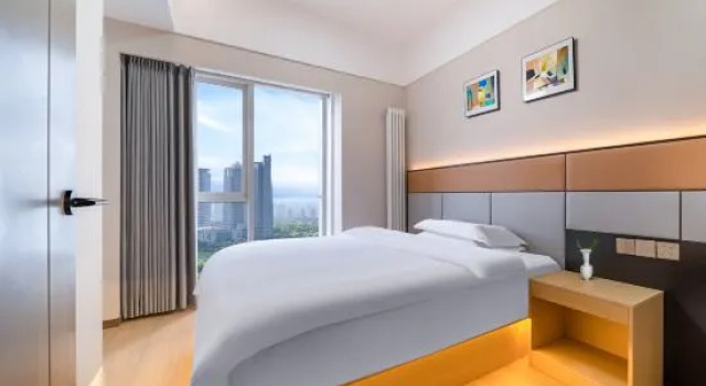 Люкс с 2 комнатами Yulanting Hotel (Zhengzhou East High-speed Railway Station Yulin Square)