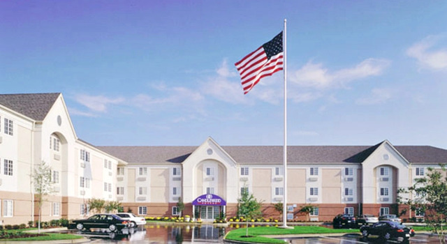Кровать в общем номере Sonesta Simply Suites Dallas Las Colinas