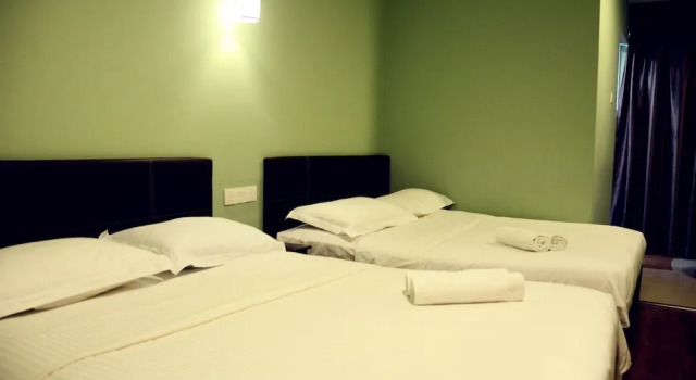 Четырёхместный семейный номер Deluxe Hotel Sri Rembia