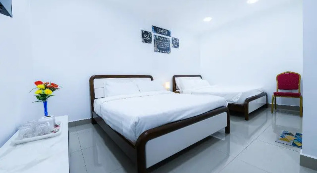 Четырёхместный люкс Capital O 90543 Sp Star Hotel