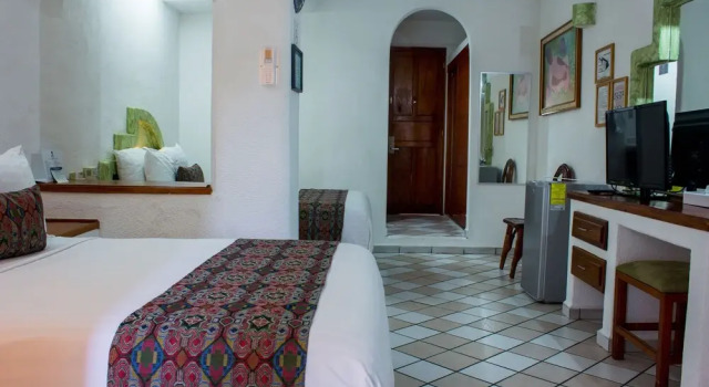 Четырёхместный номер Standard с балконом и с видом на город Best Western Posada Chahue