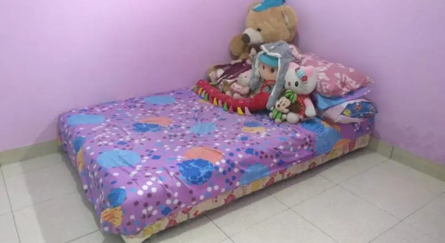 Кровать в общем номере Yati Homestay