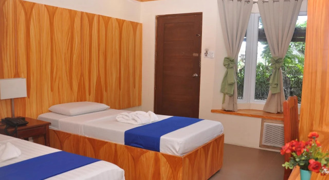 Sikatuna Beach Hotel, Book Hotel Illin Island Philippines