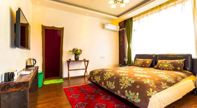 Номер Deluxe Shangri-la Linglong Inn