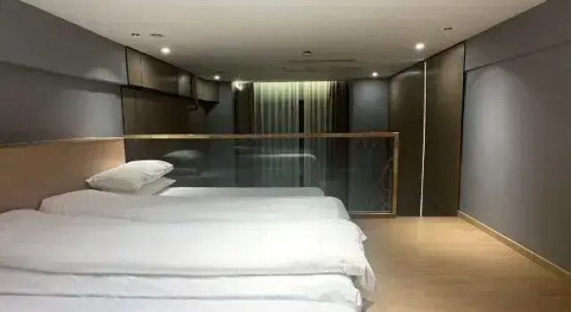 Кровать в общем номере Qingsi Smart Hotel