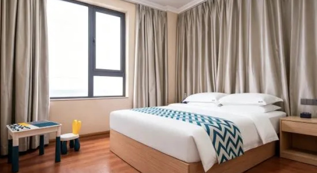 Семейный люкс с видом на город Shangyi Hotel (Jiangnan Wanda Medical Center)