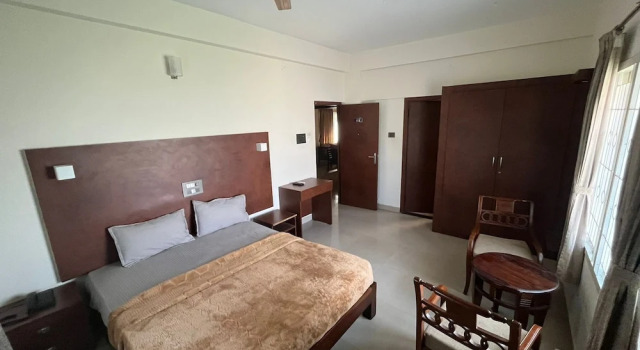 Номер Executive PPH Living Athithi Inn Corporate Stay