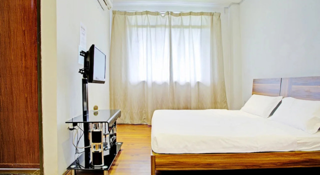 Номер Deluxe OYO 90597 Delightful Holiday Inn