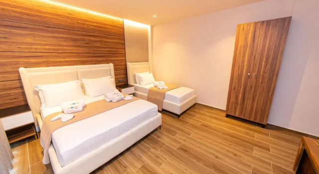 Deluxe Dreier Zimmer mit Balkon und mit eingeschränktem Meerblick Hotel Utopia