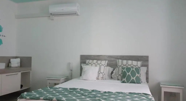 Suite 2 Schlafzimmer mit Gartenblick La Mariposa