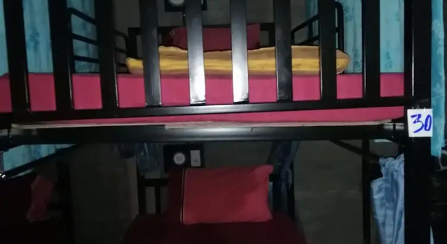 Кровать в общем номере Neverland Hostel
