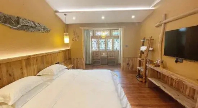 Двухместный семейный люкс Shunan Courtyard Homestay (Southern Sichuan Bamboo Sea China Giant Panda Courtyard)