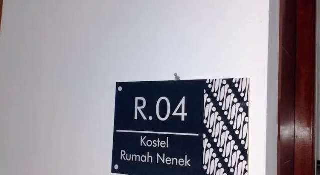 Кровать в общем номере Kostel Rumah Nenek