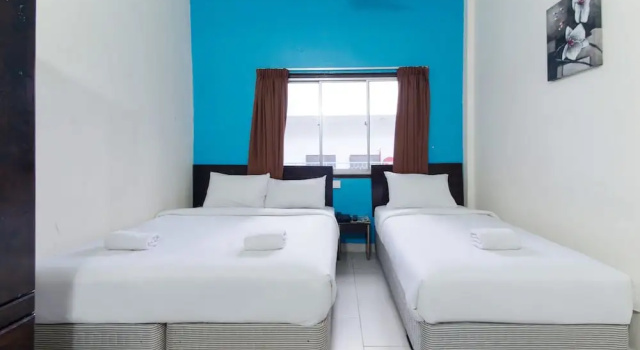 Трёхместный номер Standard Hotel Grand Mutiara
