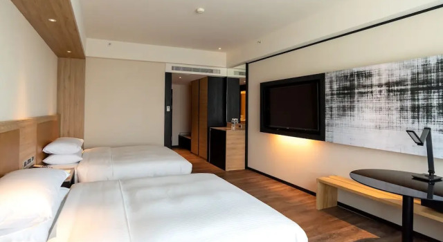 Четырёхместный номер Standard Sheraton Taoyuan Hotel
