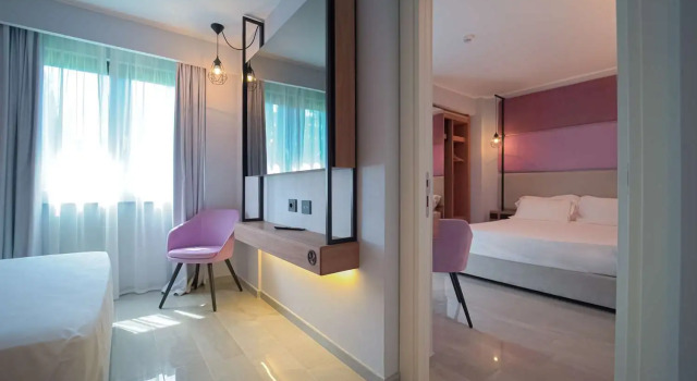 Четырёхместный семейный номер Standard Best Western Plus Sabaudia Hotel