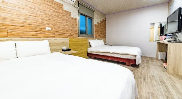 Четырёхместный номер Deluxe Beauty Garden Hotel - Jiaoxi