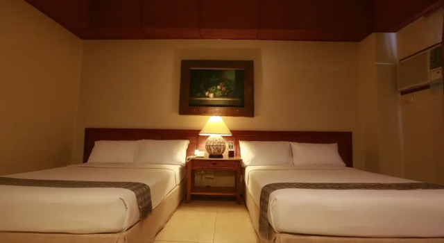 Deluxe Quadruple room Java Hotel