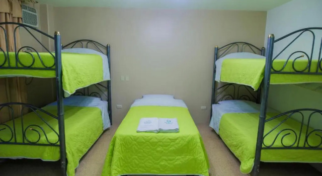 Кровать в общем номере North Star Hostal Guayaquil