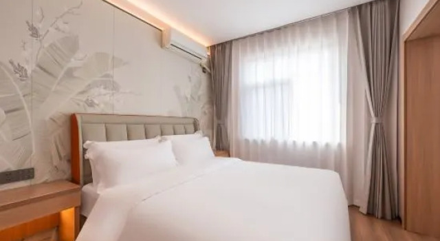 Люкс Xu Ge Hotel （Qingdao West Station Hotel）
