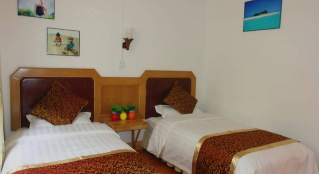 Zhangjiajie Dingding Inn Yuanjiajie Shop, Забронировать Отель Jiawan Хунань
