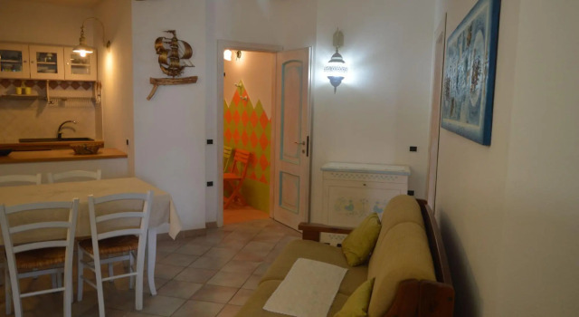 Apartment surrounded by greenery 5 minutes on foot from the beaches of Baia Caddinas and the large s-S'Abba e sa Pedra