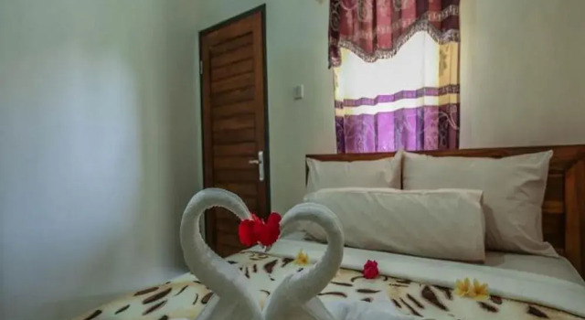 Putu Lembongan Lodge, Забронировать Отель Отели Лембонган с парковкой, рядом с Пляж Нуса Лембонган, Парковка