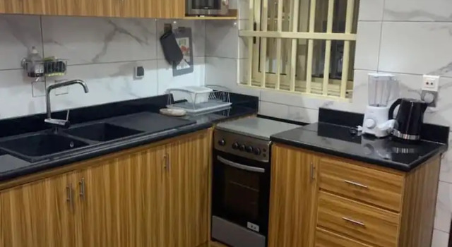 Classique appartement 2 chambres sous-sol Vue jardin Residence Mh Services