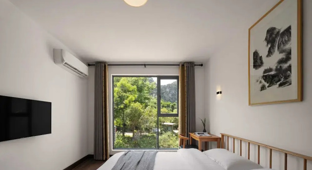 Castle peak yard Inn Free railway st ation pick-up by 2 nights, Забронировать Отель Недорогие отели Гуйлинь, недорого